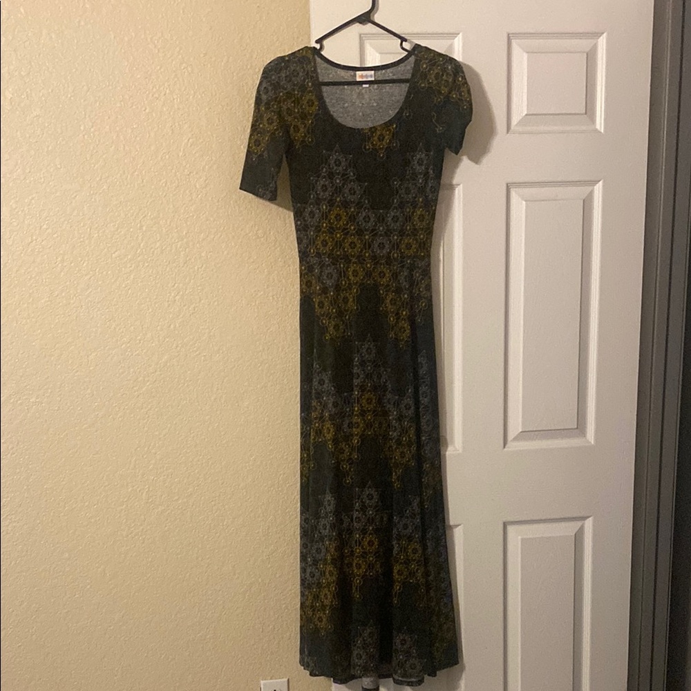 Elegant Black and Gold Patterned Dress